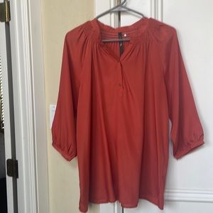 reneec. burnt orange top